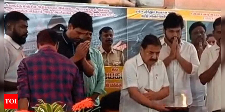 Sivakumar and Karthi Pay Respects at Vijayakanth’s Gravesite, Presenting Garlands