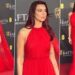 Dua Lipa Stuns in Crimson Dress at BAFTA 2024